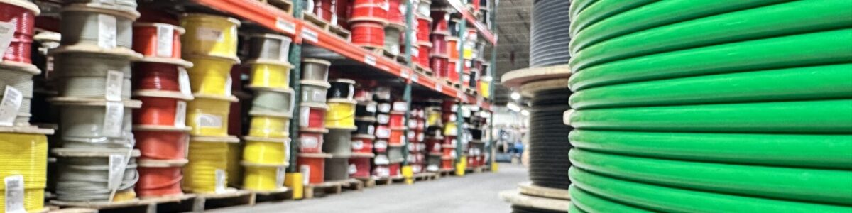 Warehouse full of multi-colored coated cable spools