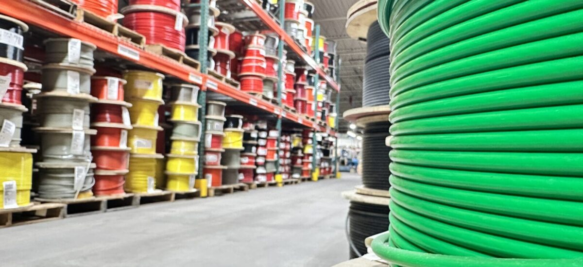 Warehouse full of multi-colored coated cable spools