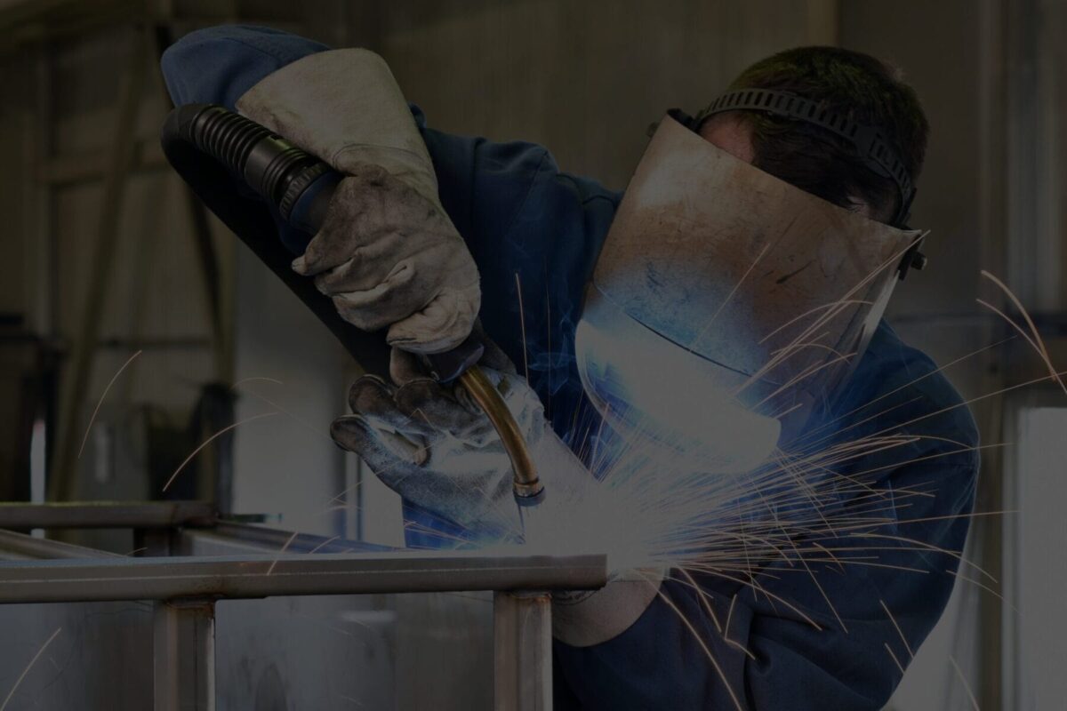 Worker Welding Metal