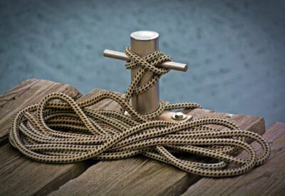 rope secured around dock cleat